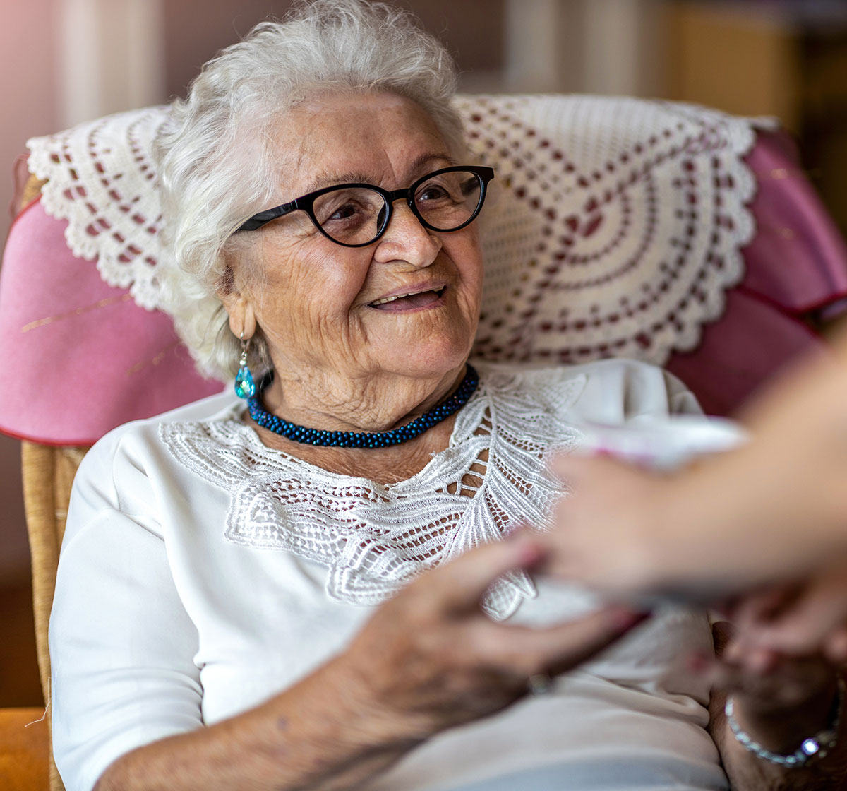 psychologist-08 Elderly woman receiving support at home from a carer