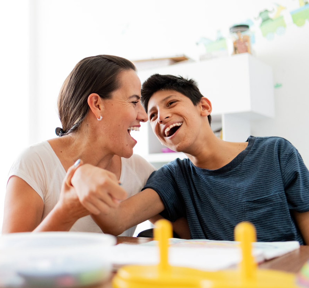 A carer offers a man with disability support